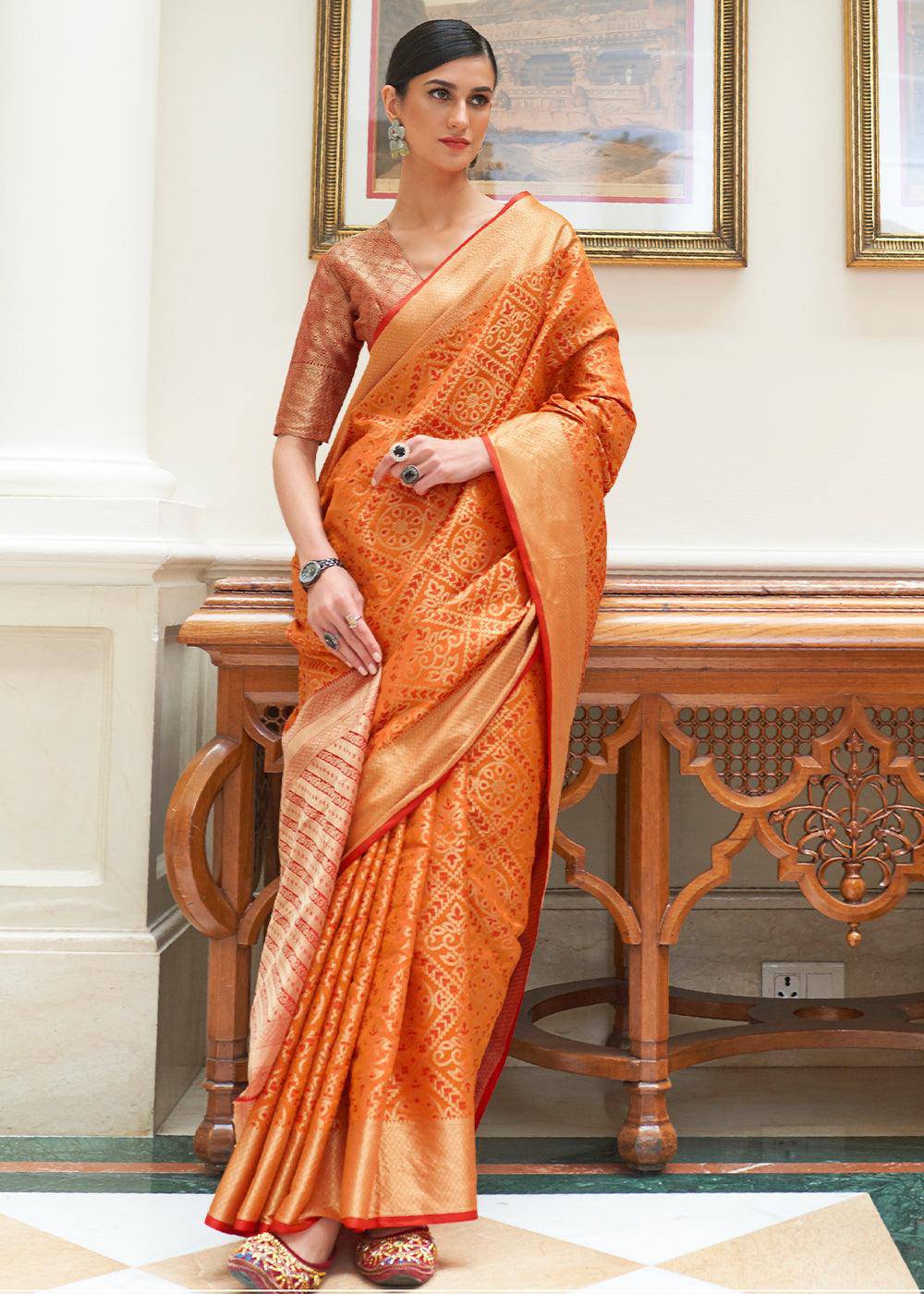 Carrot Orange Zari Woven Patola Silk Saree | Stitched Blouse - qivii