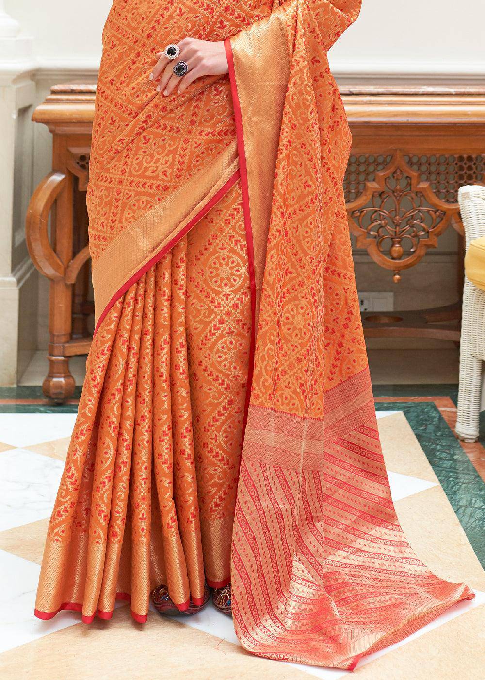 Carrot Orange Zari Woven Patola Silk Saree | Stitched Blouse - qivii