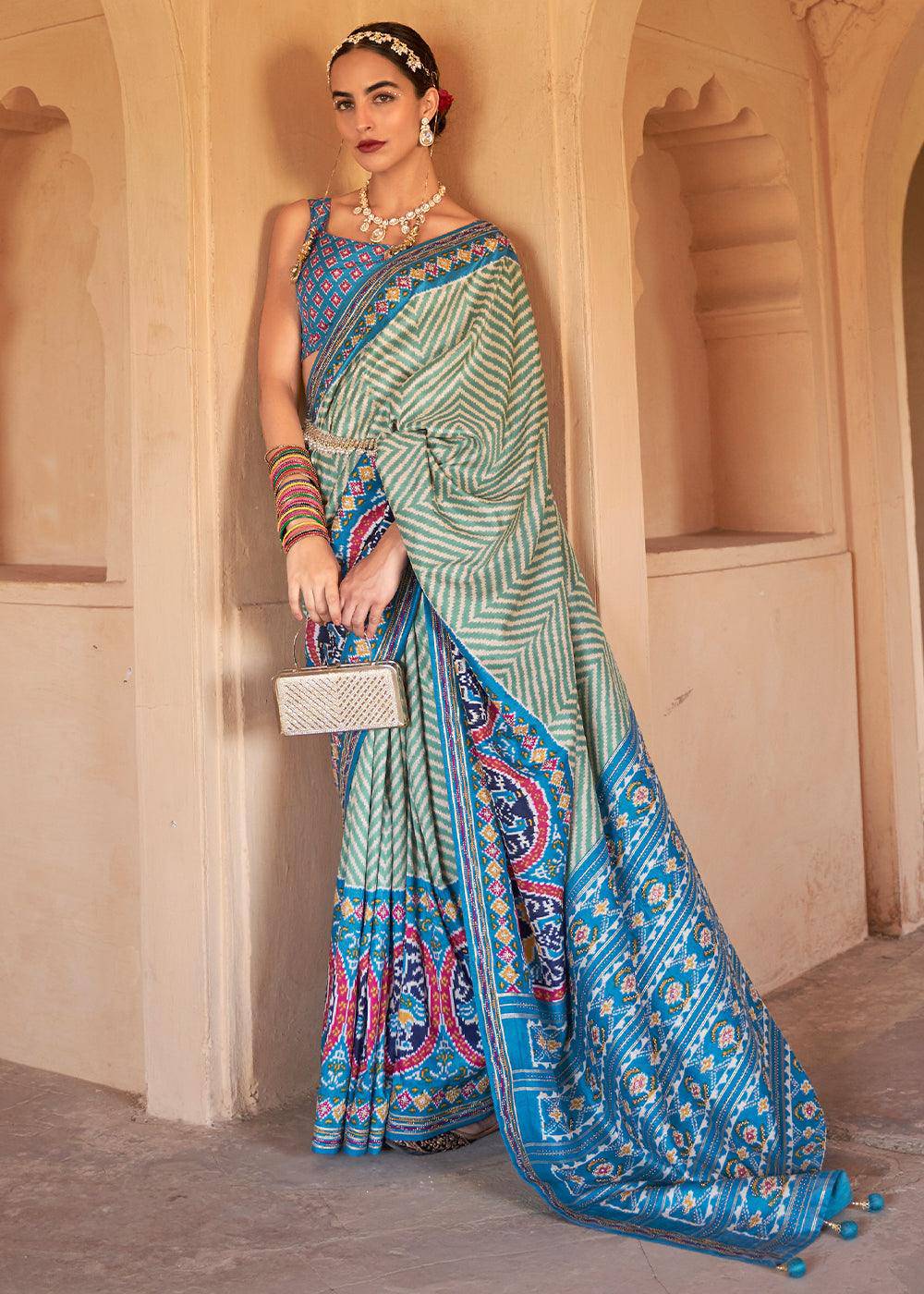 Cerulean Blue Printed Patola Silk Saree with Zari Border & Tassels on Pallu | Stitched Blouse - qivii