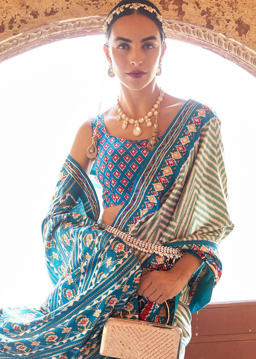 Cerulean Blue Printed Patola Silk Saree with Zari Border & Tassels on Pallu | Stitched Blouse - qivii