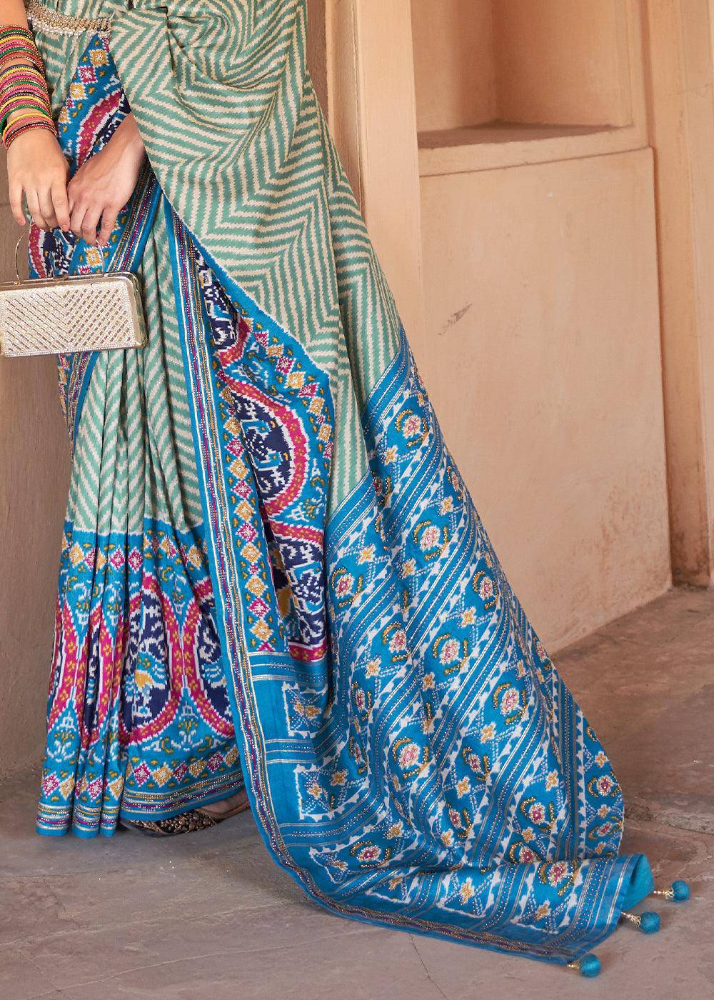 Cerulean Blue Printed Patola Silk Saree with Zari Border & Tassels on Pallu | Stitched Blouse - qivii