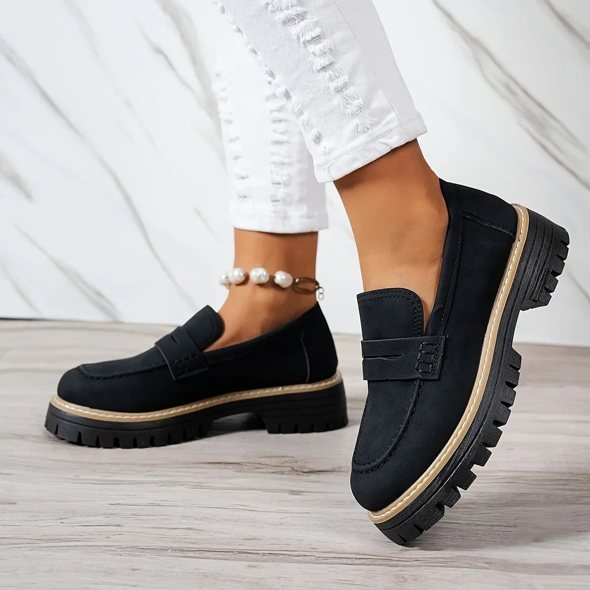 Black women's orthopedic loafers by Qivii, Cheney by Hudson Ridge, featuring comfortable design and premium leather material.