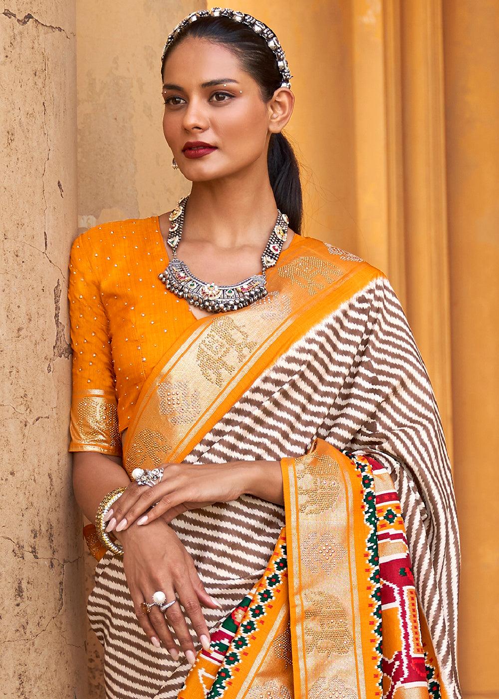 Chrome Yellow Designer Patola Silk Saree with Zari Border & Stone work | Stitched Blouse - qivii