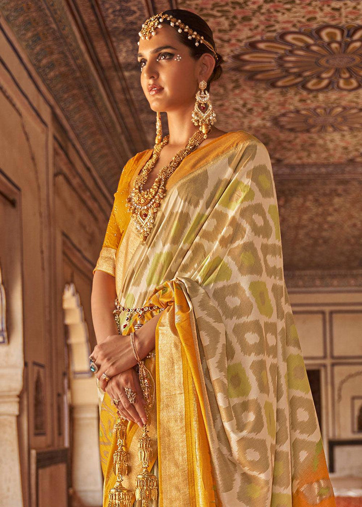 Cream & Yellow Printed Patola Dola Silk Saree with Zari Border | Stitched Blouse - qivii