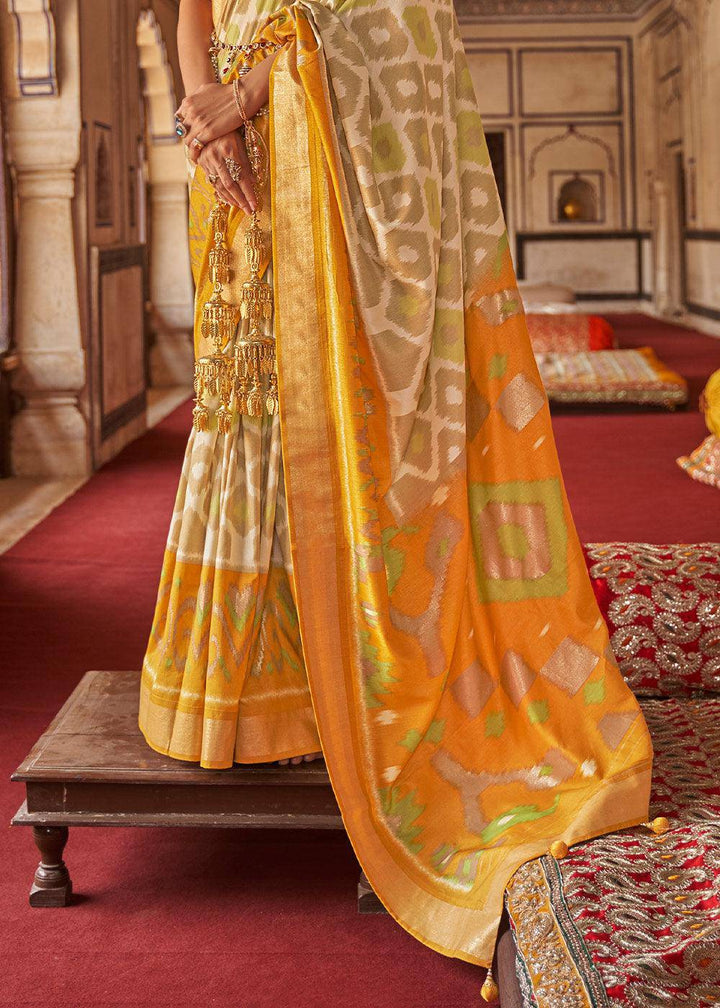 Cream & Yellow Printed Patola Dola Silk Saree with Zari Border | Stitched Blouse - qivii