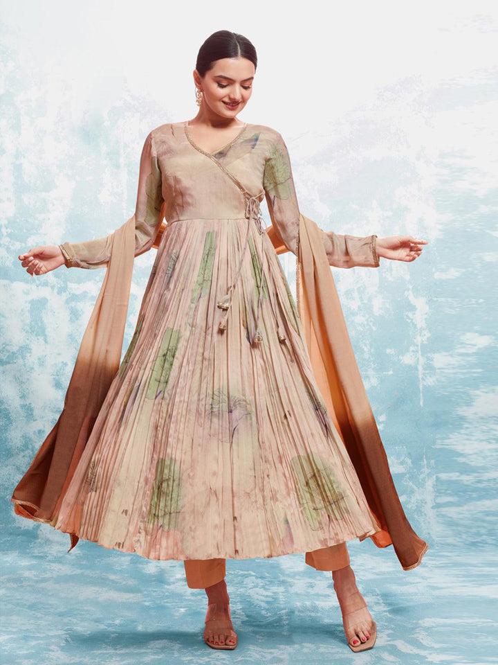 Cream color anarkali dress with intricate golden embroidery and matching dupatta by Qivii