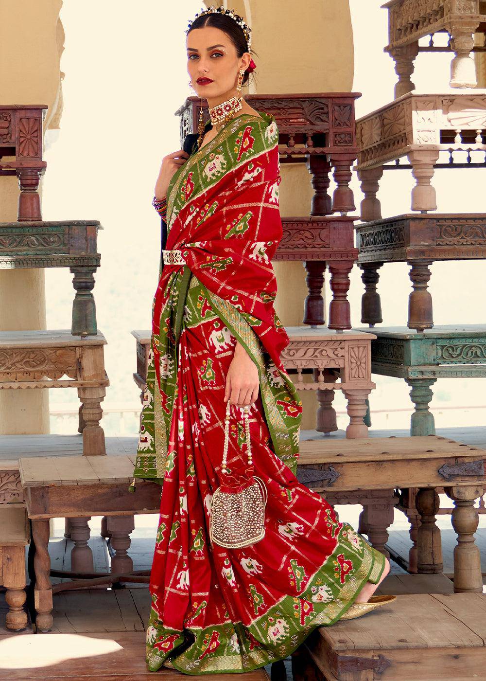 Crimson Red Printed Patola Silk Saree with Zari Border & Tassels on Pallu | Stitched Blouse - qivii