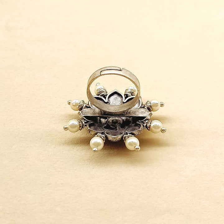 Forum Pearl White Oxidized Silver Plated Boutique Ring displayed on luxurious velvet cushion