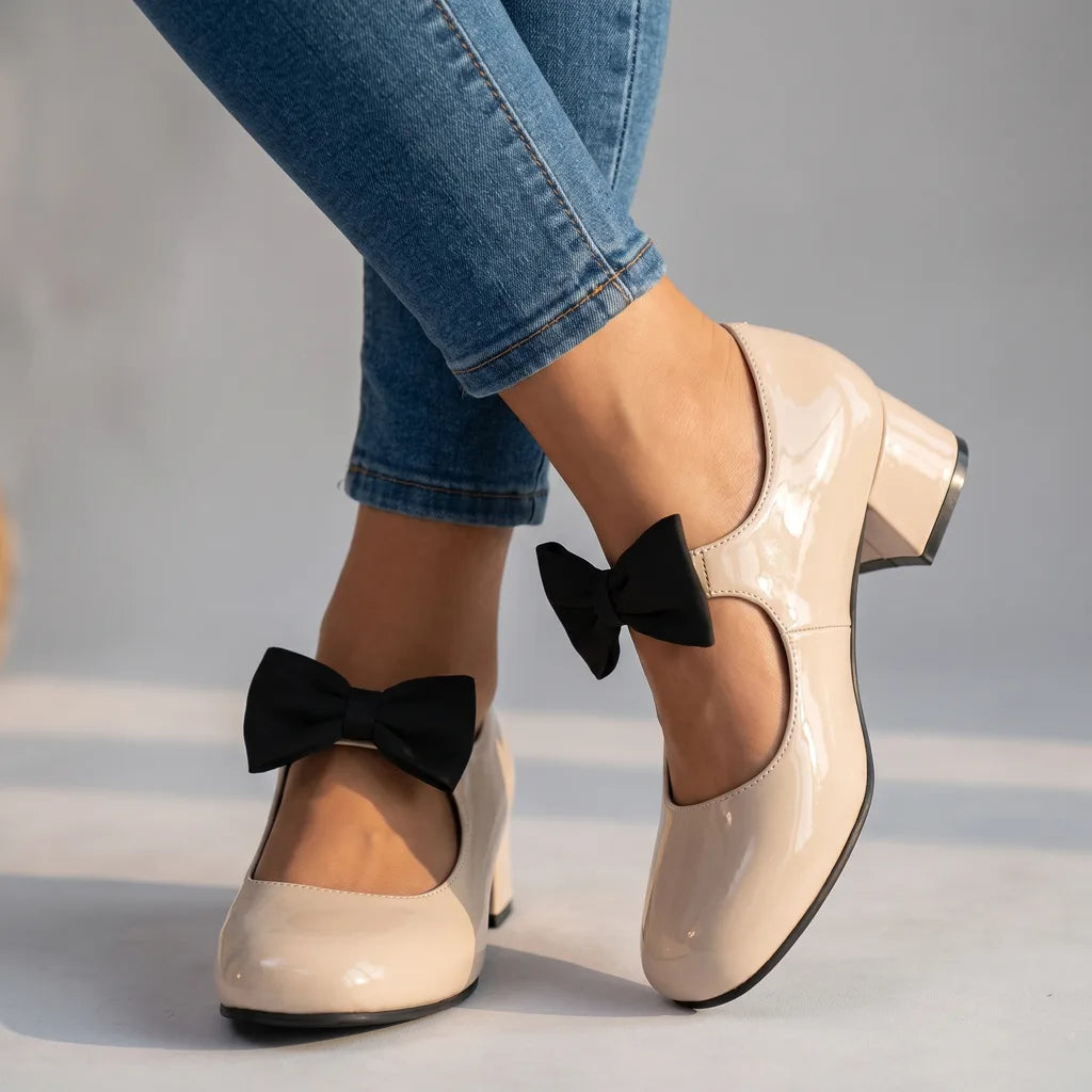 Doris women's bow-tie Mary Jane heels by Hudson Ridge in apricot, showing stylish footwear with a bow detail and classic heel.