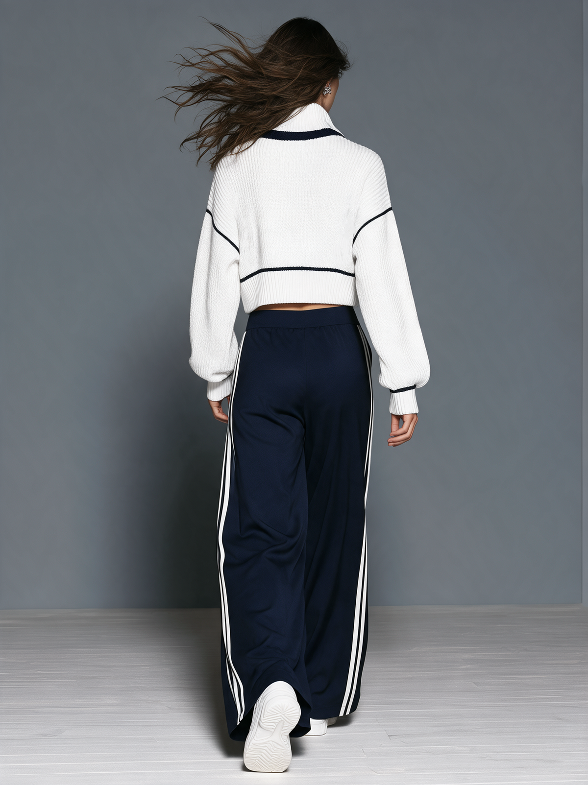 Women's Casual Two-Piece Set Featuring A White Long-Sleeved Knit Top And Dark Blue Sweatpants