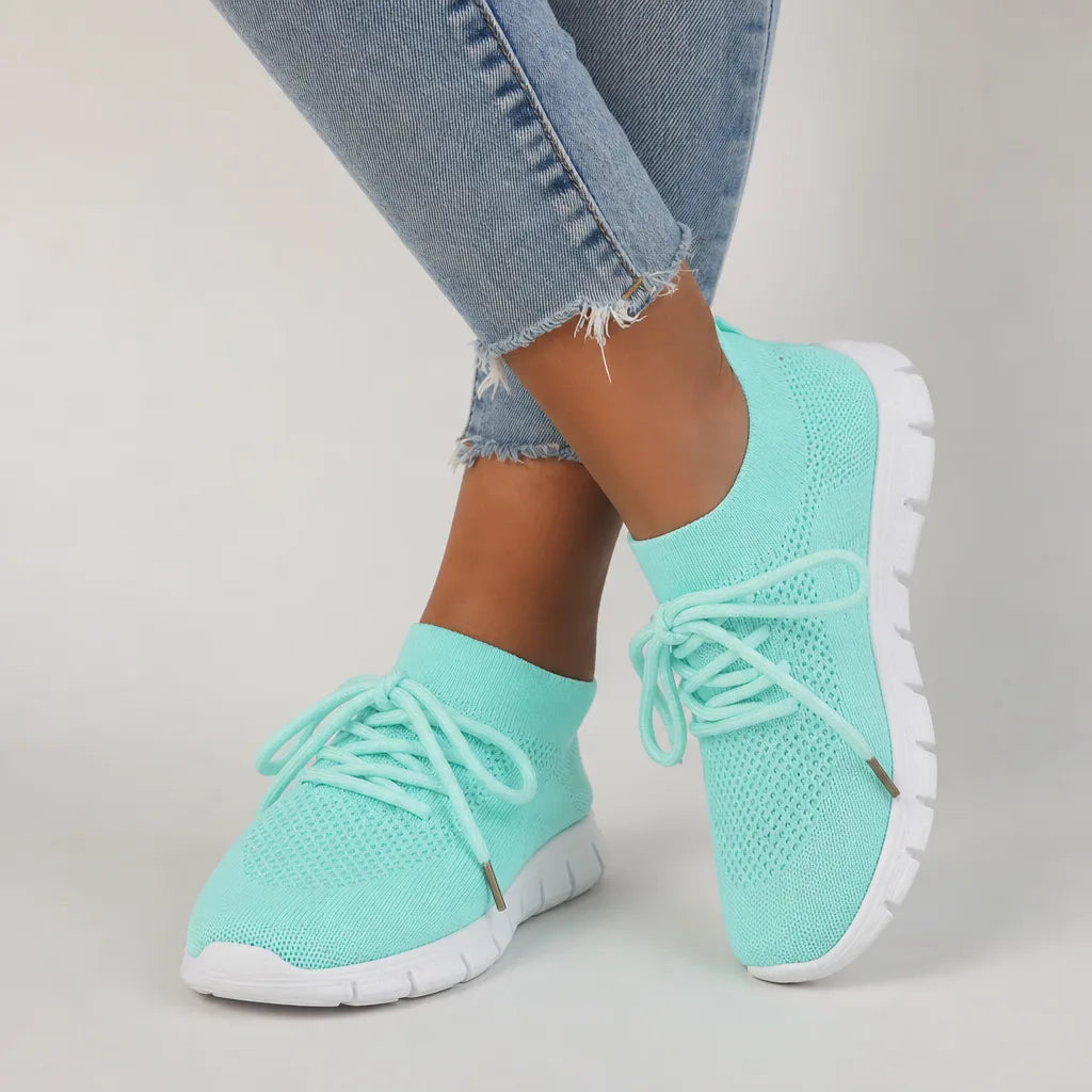 Green women's orthopedic walking sneakers by Qivii, designed for comfort and support, from Hudson Ridge.