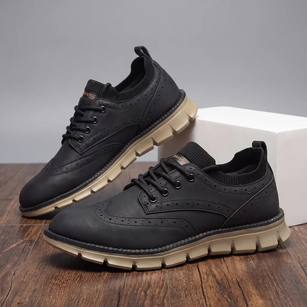 Black men's casual sneakers by Qivii Hudson Ridge, comfortable loafers with sleek design and rubber sole.