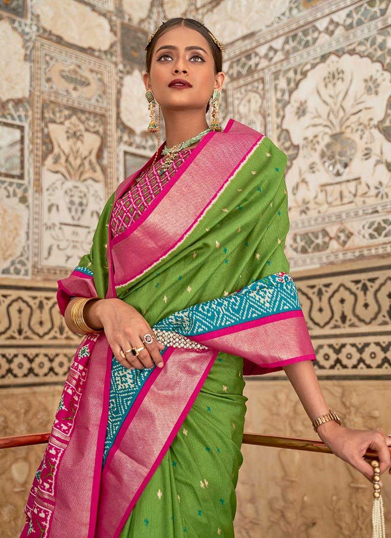 Enchanting Green Color Patola Printed Silk Saree With Boat Neck Blouse  - By Kreeva