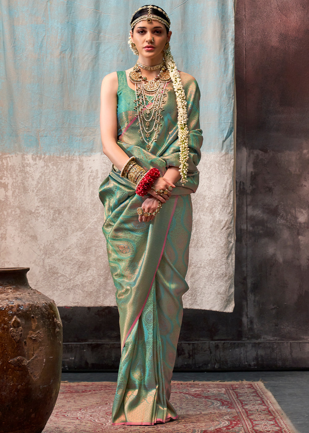 Pastel Green Two Tone Kanjivaram Silk Saree Embellished with Intricate Gold Zari work : Top Pick - qivii