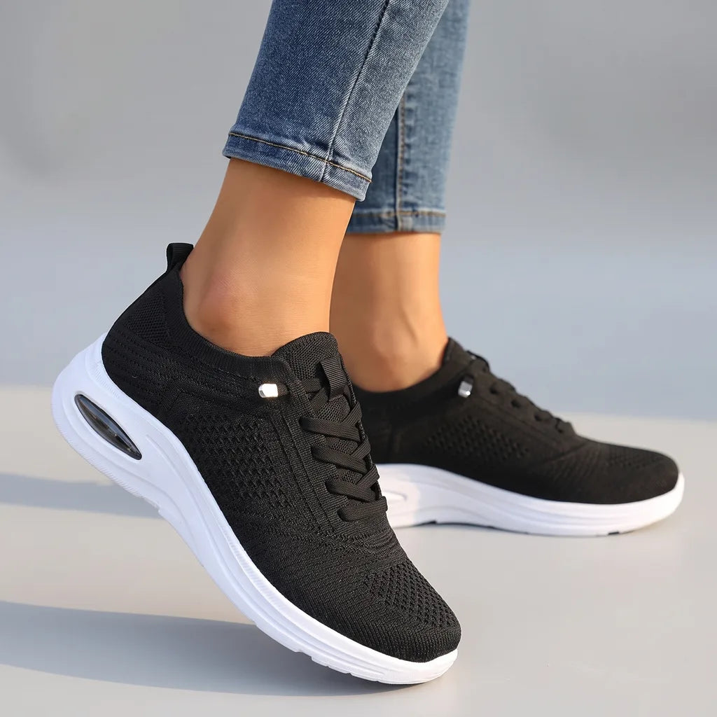 Black Eve women's orthopedic mesh sneakers by Hudson Ridge, showcasing breathable mesh upper and supportive sole for comfortable walking.