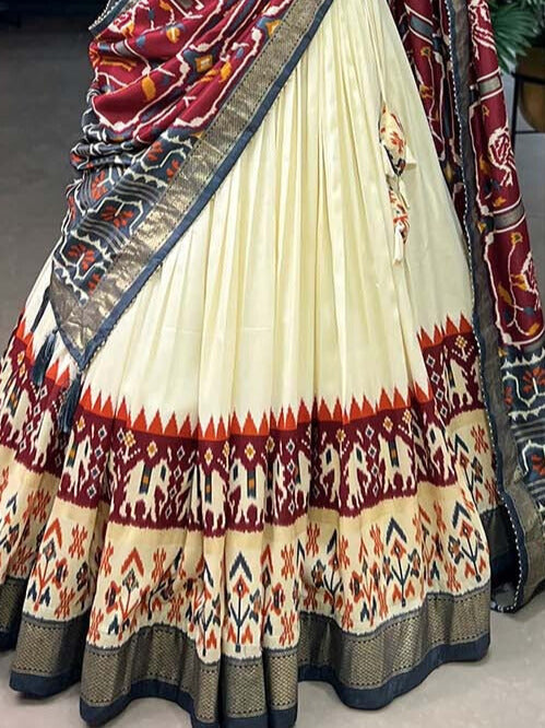 Tussar Silk Patola Print With Foil Printed Silk Lehenga Choli In Maroon Color