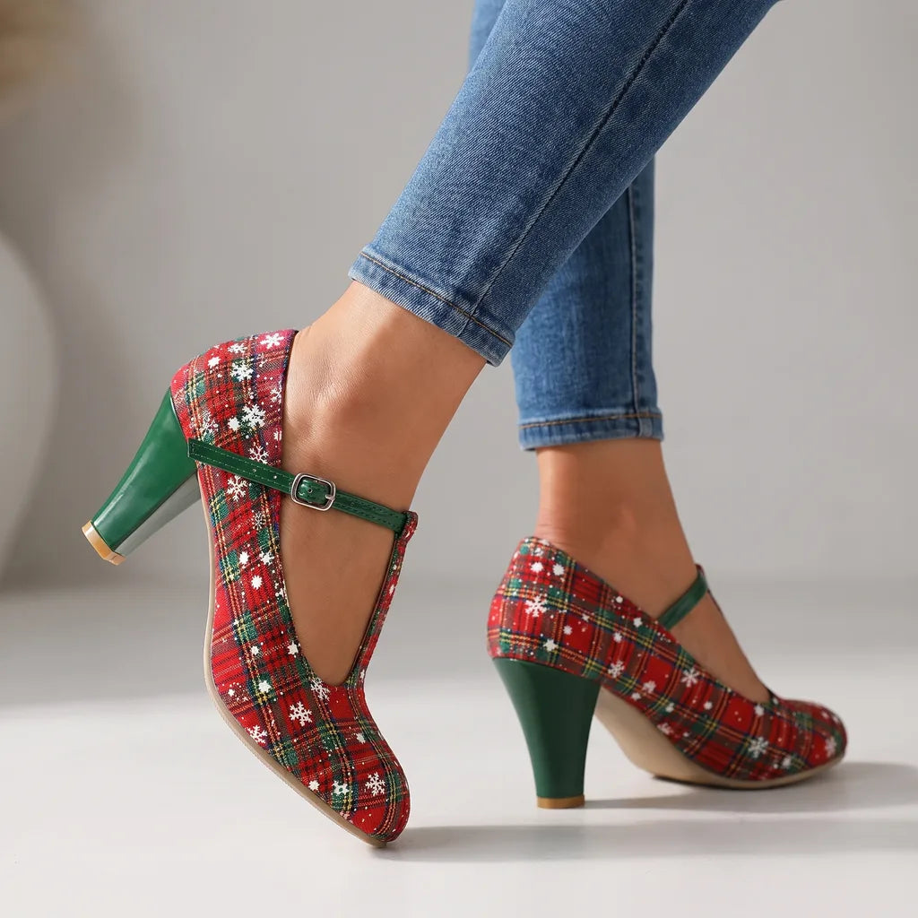 Felicity women's festive Mary Jane Christmas heels by Hudson Ridge with colorful holiday-themed design and ankle strap.