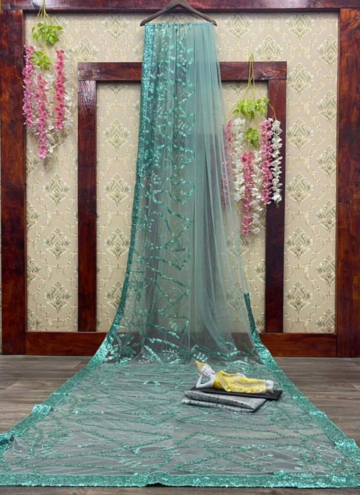 Glitzy Teal Green Color Soft Net With Sequins Base Saree  - By Kreeva