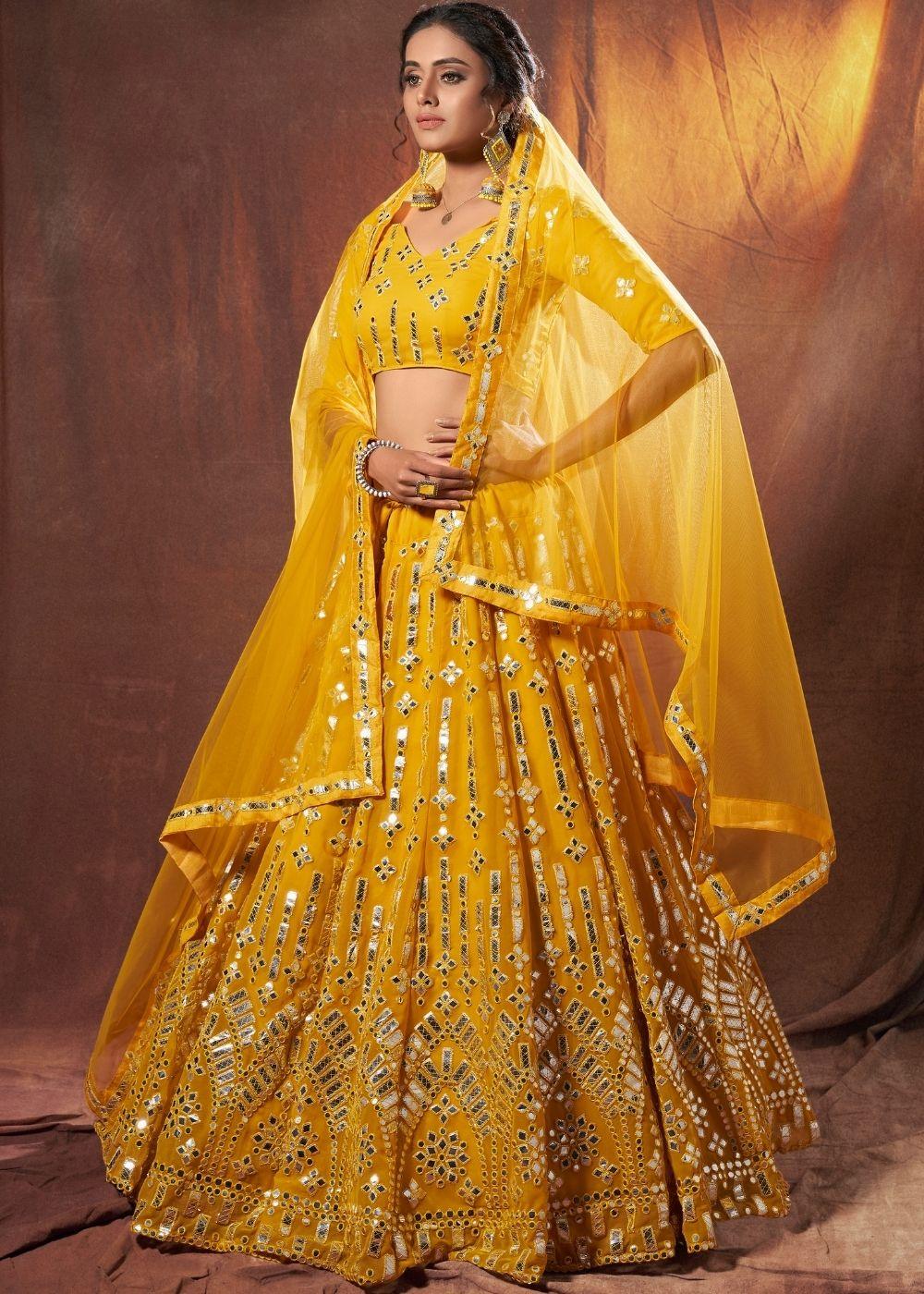 Gold Yellow Designer Georgettet Lehenga Choli with Resham & Mirror work - qivii