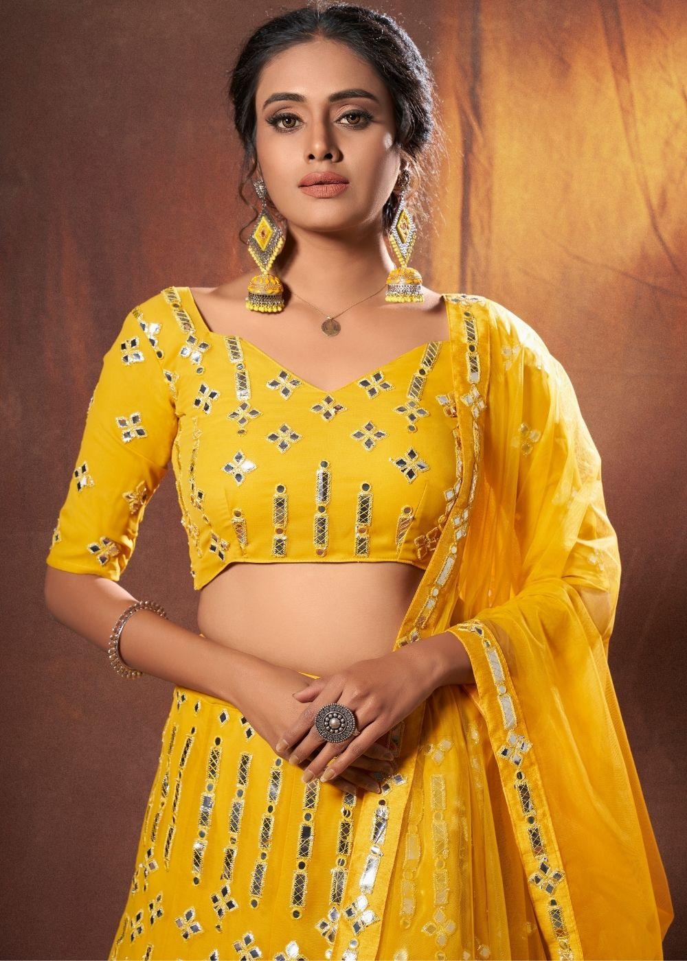 Gold Yellow Designer Georgettet Lehenga Choli with Resham & Mirror work - qivii