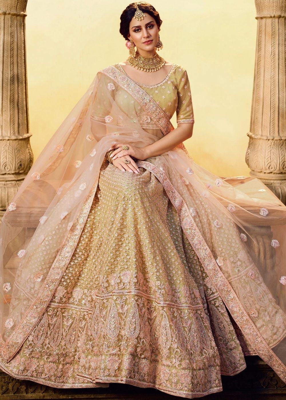 Golden Silk and Soft Net Bridal Lehenga Choli with Resham Embroidery and Aari work - qivii