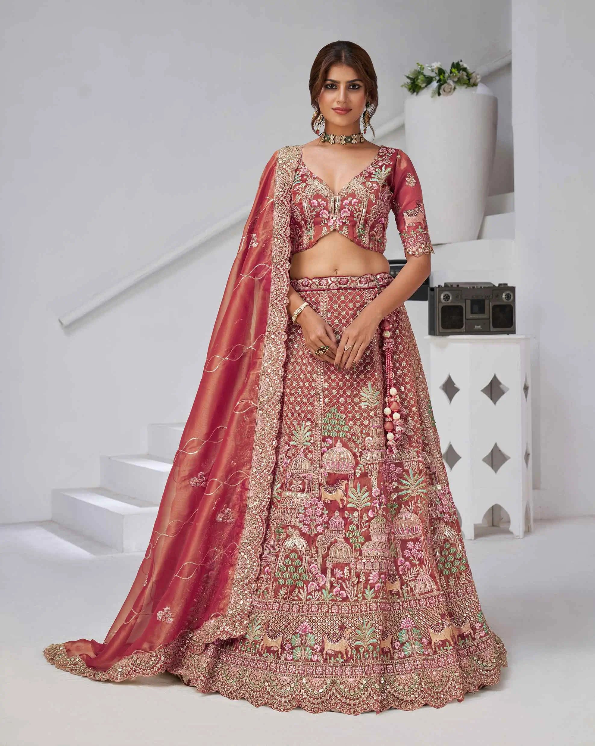 Pinkish Red Bridal Lehenga With Temple & Cow Motifs - qivii