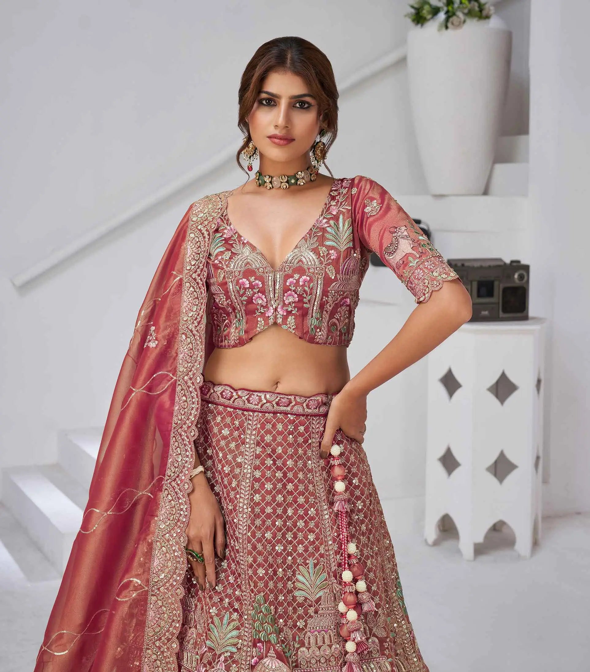 Pinkish Red Bridal Lehenga With Temple & Cow Motifs - qivii