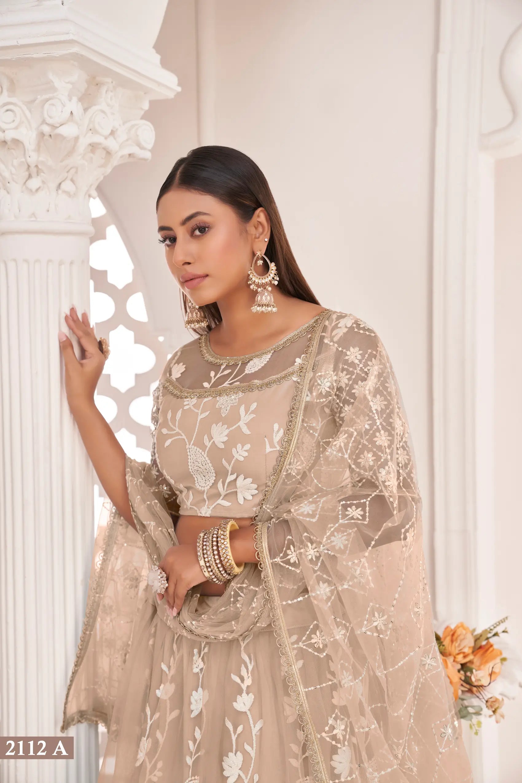 Beige Net Lehenga Choli With White Cotton Thread Work, Zari Work & Sequence Work