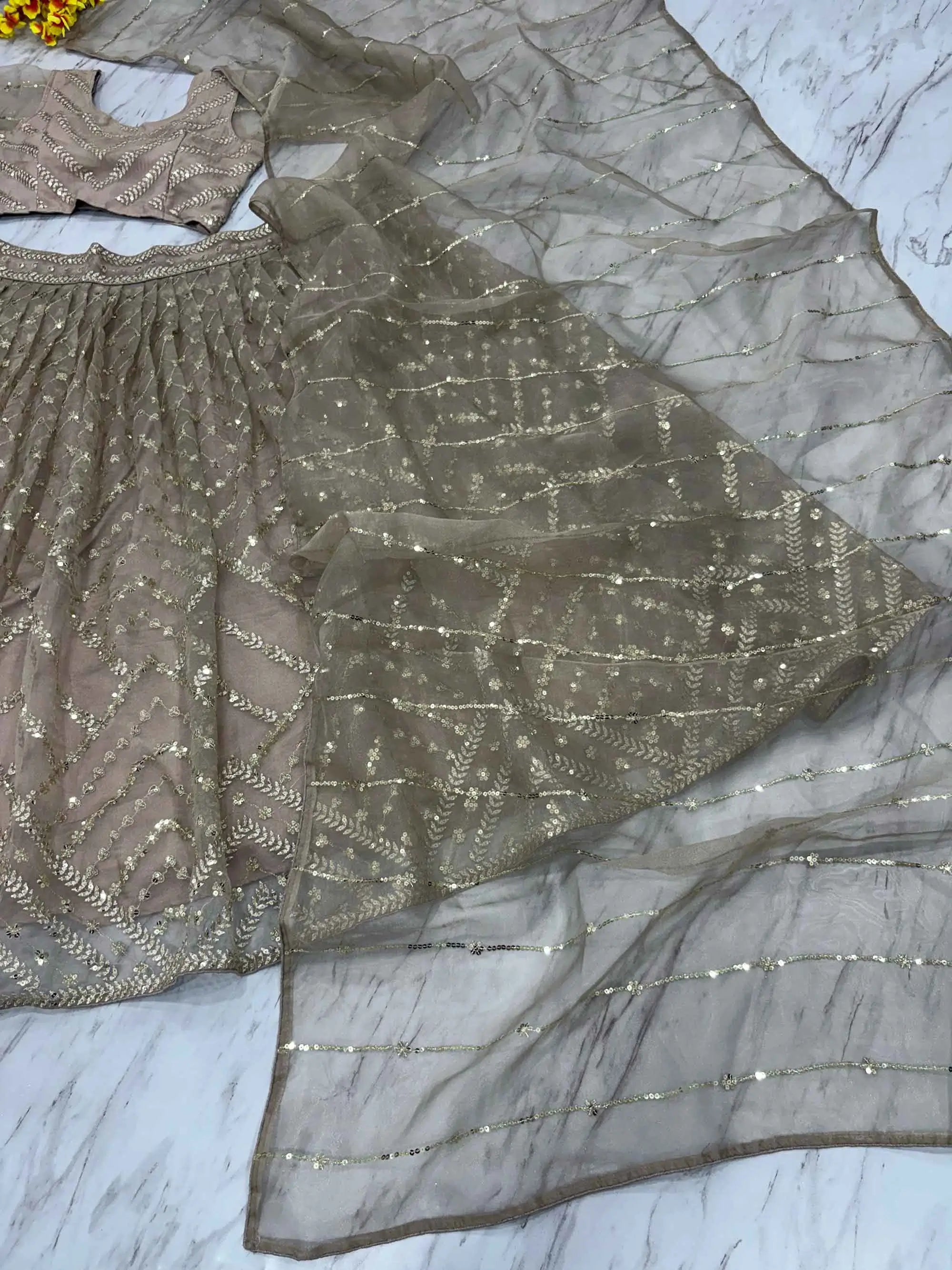 Beige Organza Lehenga With Zari Thread Heavy Sequins Embroidery Work