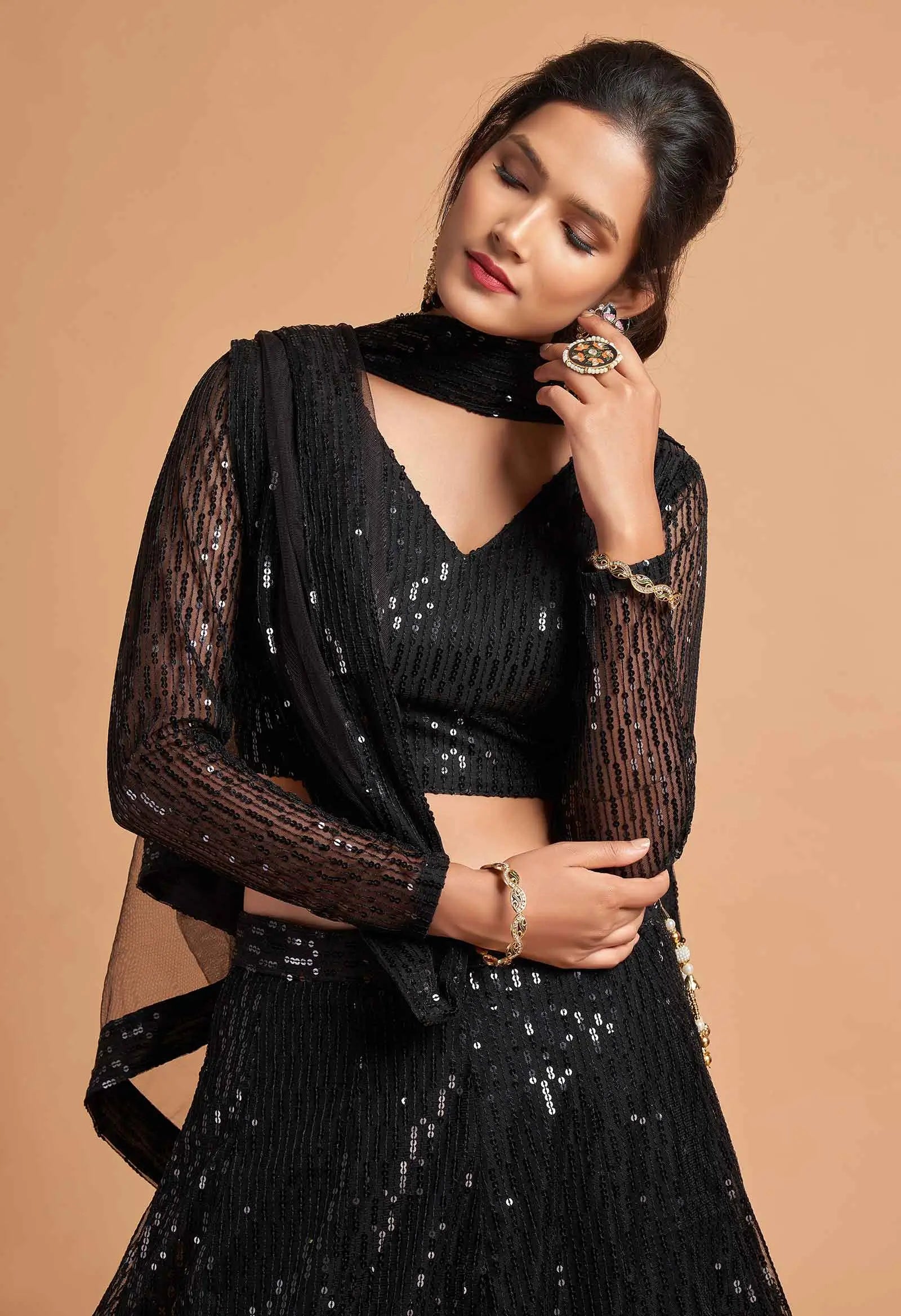 Black Soft Net Lehenga Choli With Thread And Multiple Sequins Embroidery Work
