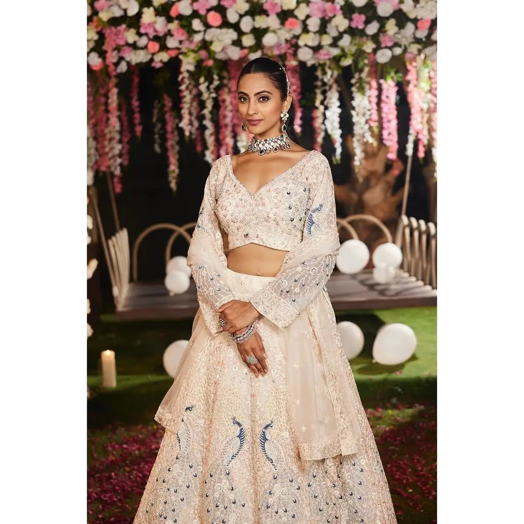 Light Peach Soft Net Lehenga With Multi Thread Sandwich Sequins Embroidery Work