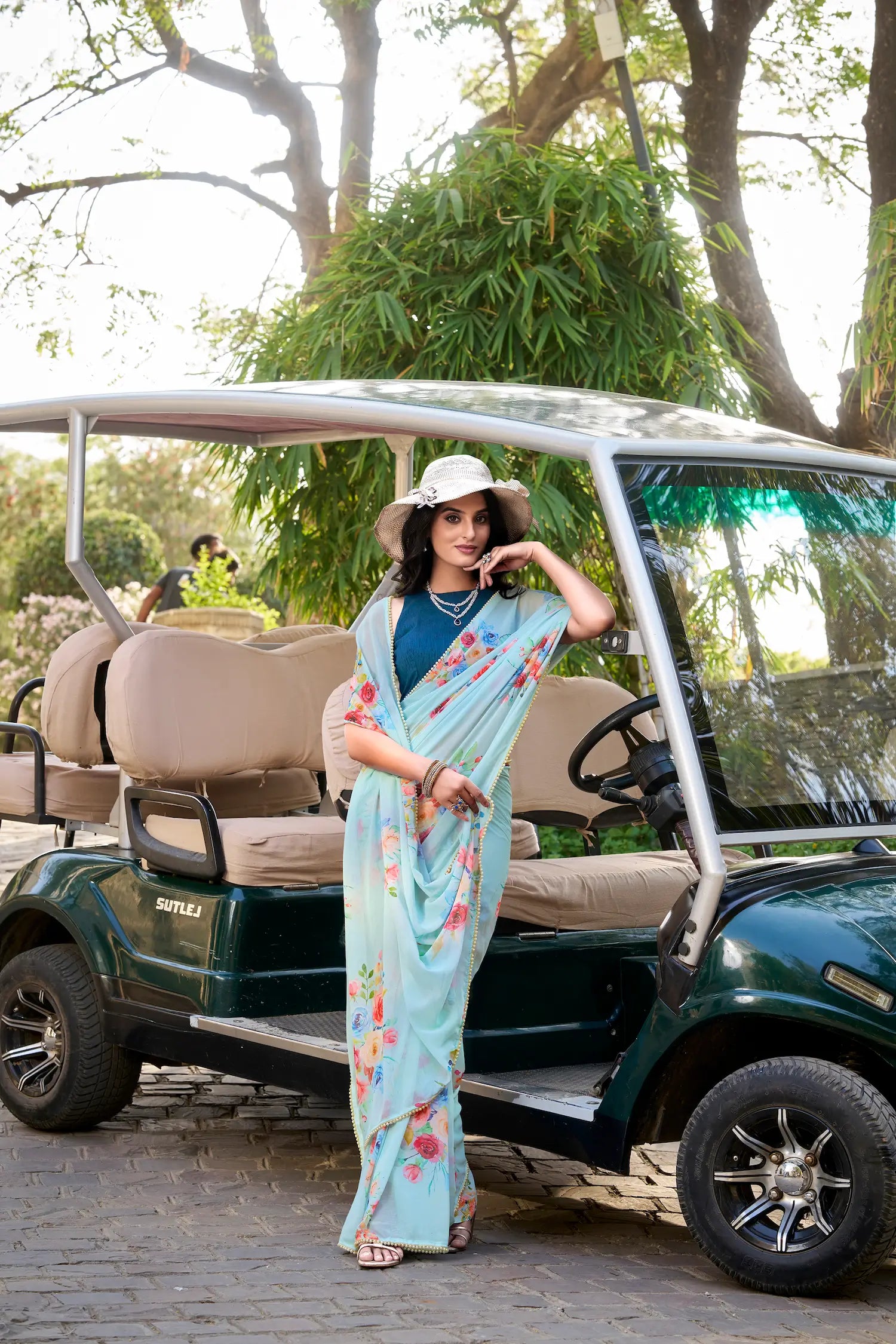 Sea Blue Weightless Marbal Saree With Floral Print & Lace Border