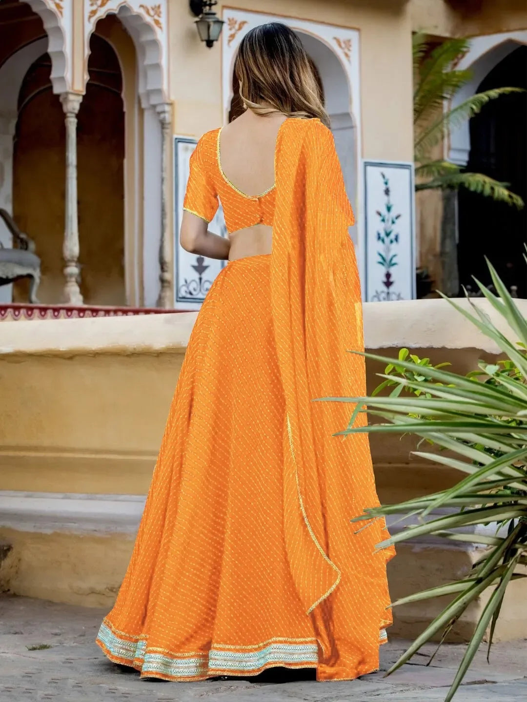 Stunning Yellow Georgette Leheriya Print Lehenga With Zari And Cording Lace Work