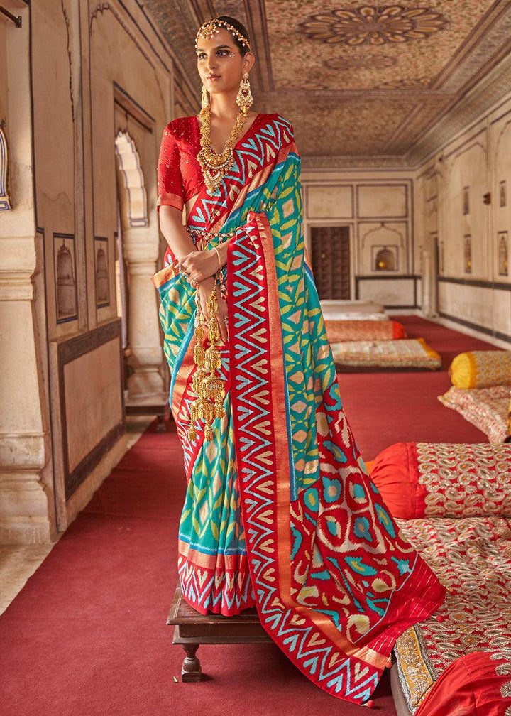 Green & Red Printed Patola Dola Silk Saree with Zari Border | Stitched Blouse - qivii