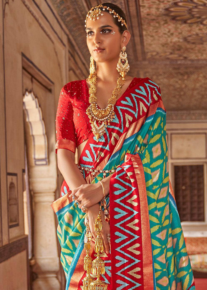 Green & Red Printed Patola Dola Silk Saree with Zari Border | Stitched Blouse - qivii