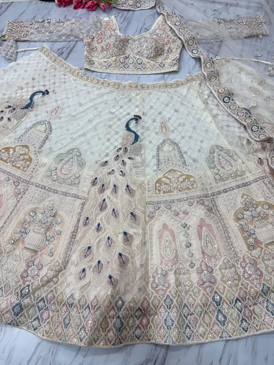White Peacock Design Net Lehenga With Thread Coding Sequins Embroidery Work - qivii