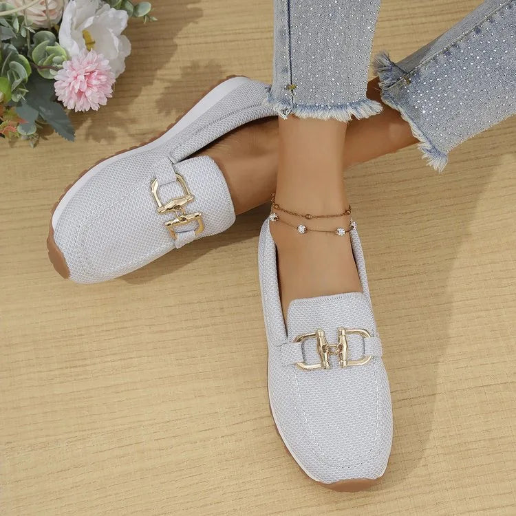 White women's orthopedic loafers by Hudson Ridge, featuring comfortable slip-on design and supportive sole for everyday wear.