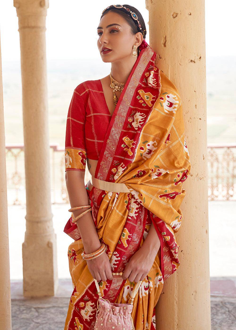 Honey Orange Printed Patola Silk Saree with Zari Border & Tassels on Pallu | Stitched Blouse - qivii