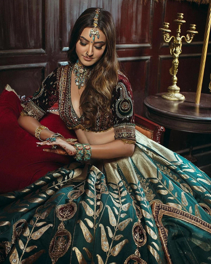 Alt text: Beautiful Indian Designer Lehenga Choli made from Mulmul Silk with intricate sequins and thread Dori work, inspired by traditional craftsmanship