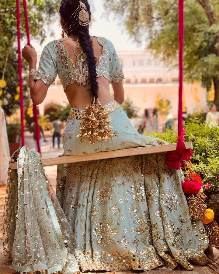 Beautiful Indian silk lehenga with intricate paper mirror work, zari work, and heavy embroidery sequence, perfect for weddings and parties - INSPIRED