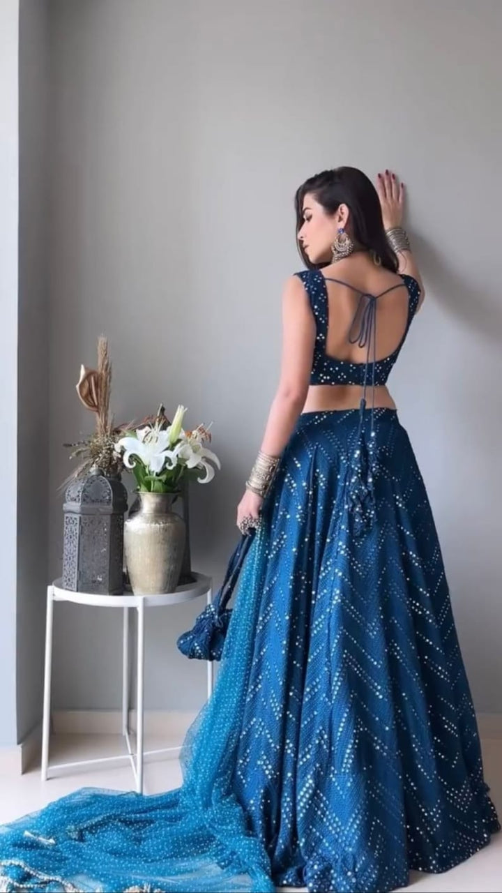 Beautiful blue lehenga choli with intricate embroidery and sequence work for weddings and parties, inspired by Bollywood fashion for women and girls