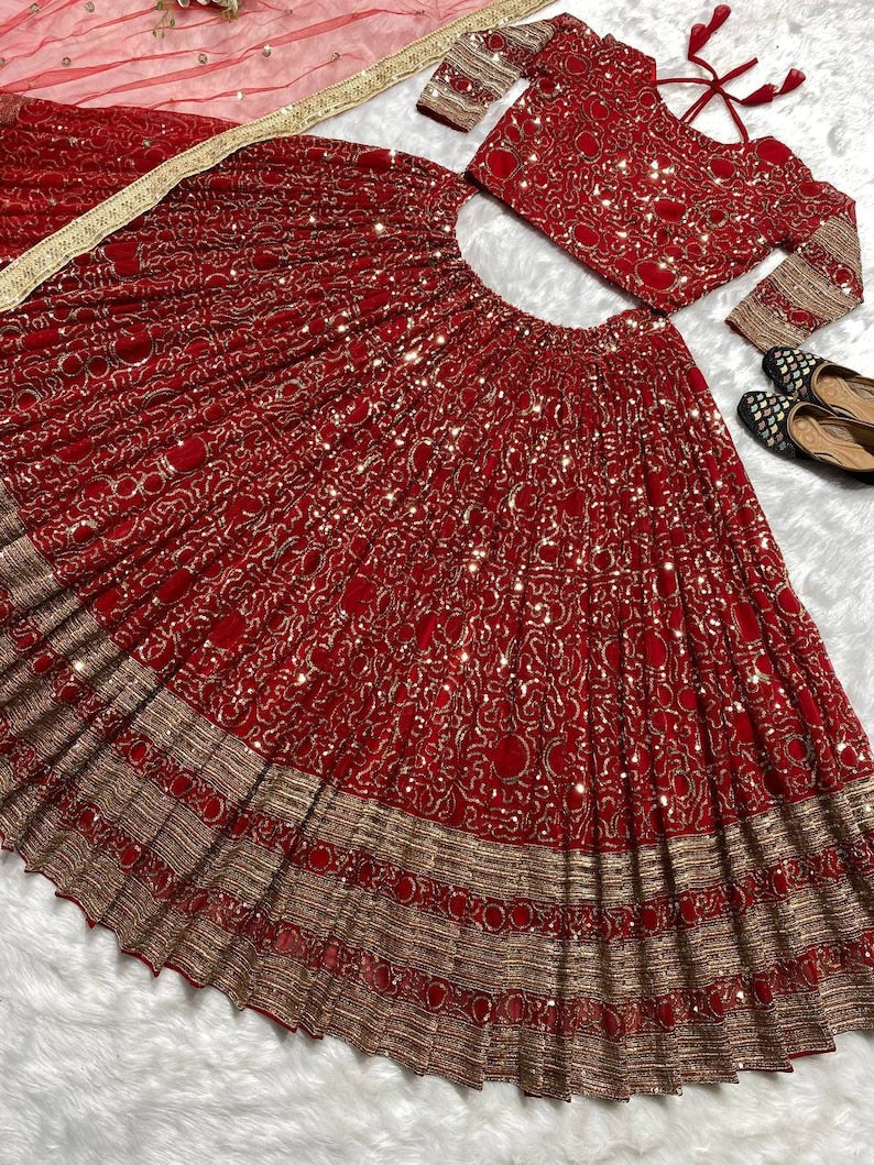 Exquisite red lehenga choli with intricate design and stunning details