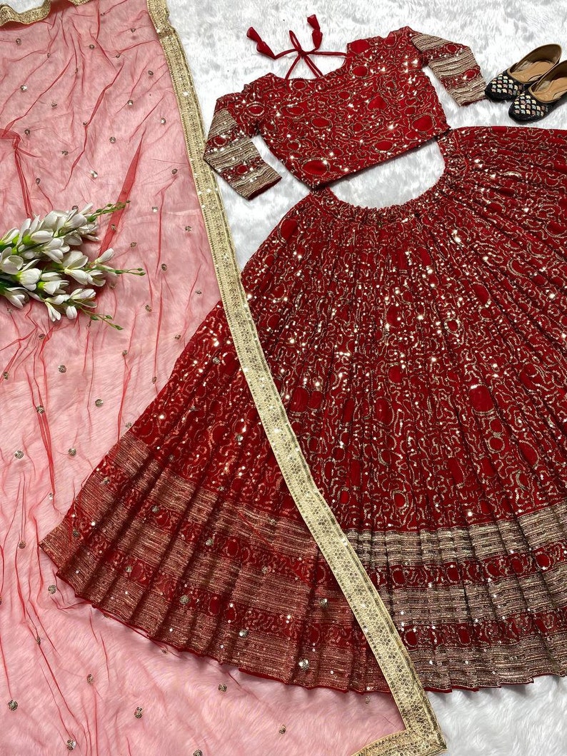 Traditional Indian women's red lehenga choli with high quality embroidery