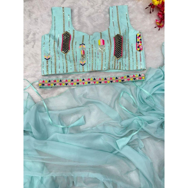 Skirt style saree in light blue with intricate ruffles