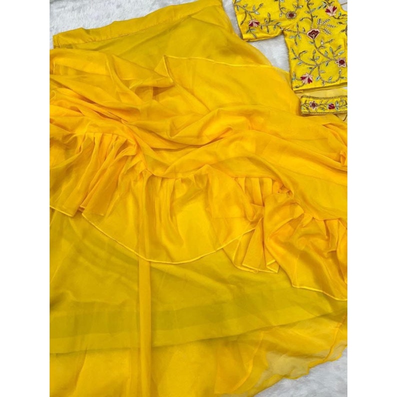 Beautiful yellow ruffles saree with belt, perfect for Indian wedding or reception party wear for women