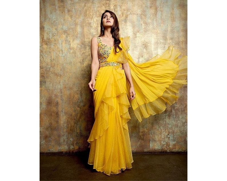 Yellow ruffles saree with belt, skirt style, Indian wedding party wear