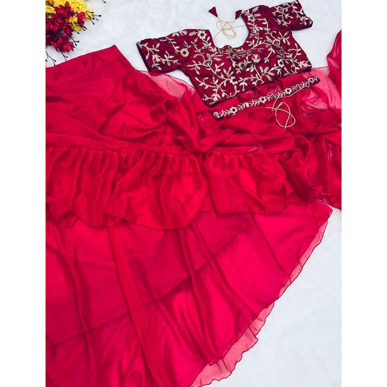 Ready to wear skirt style saree in vibrant magenta pink color, ideal for mehendi parties