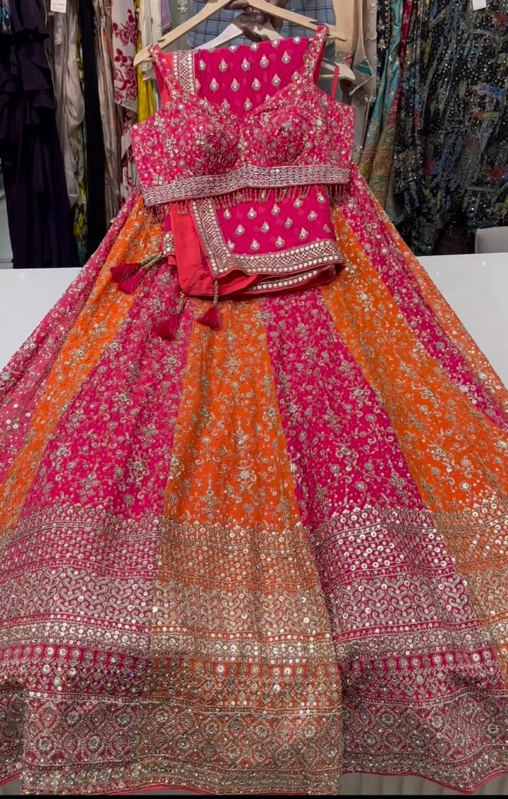  Gorgeous Pink-Orange Lehenga Choli with Detailed Embroidery for Indian Inspired Look