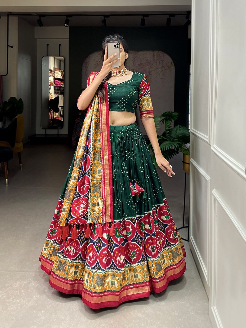 Indian Tussar Silk Patola Lehenga choli with intricate patola print design and foil work for girls' Indian traditional lehenga wear