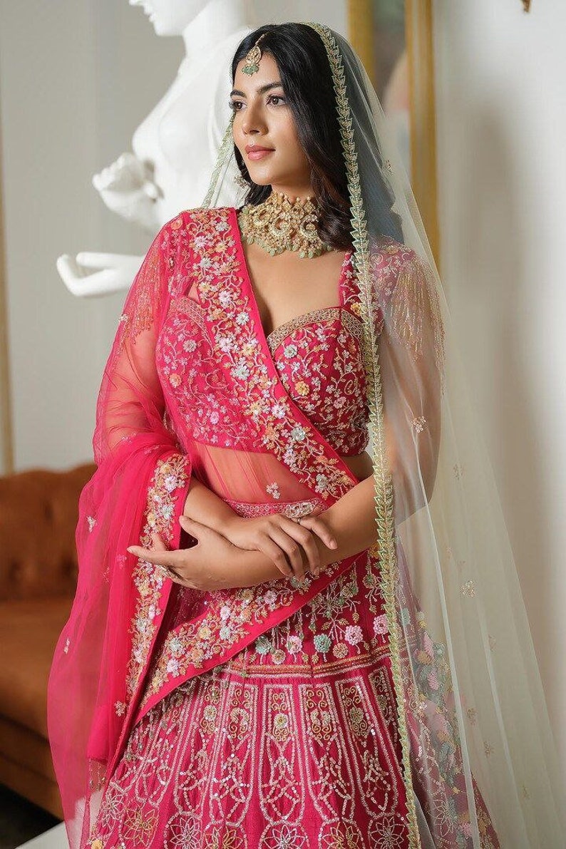 Beautiful pink lehenga choli with intricate thread and sequins embroidery for girls